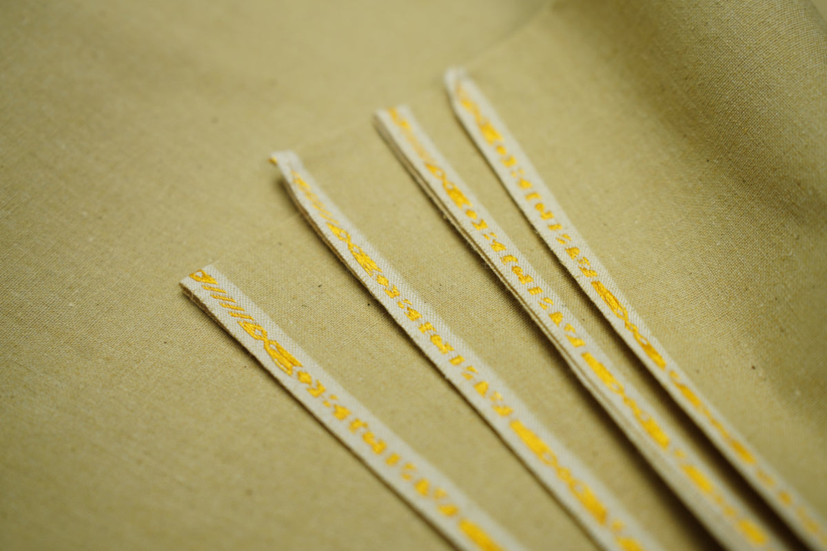 Close-up of Desert Sand Karandi Cotton fabric showing its textured weave